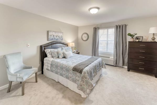 Cozy private resident room with a bed and decor