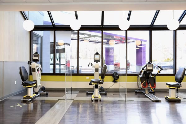 Exercise equipment in a bright fitness room