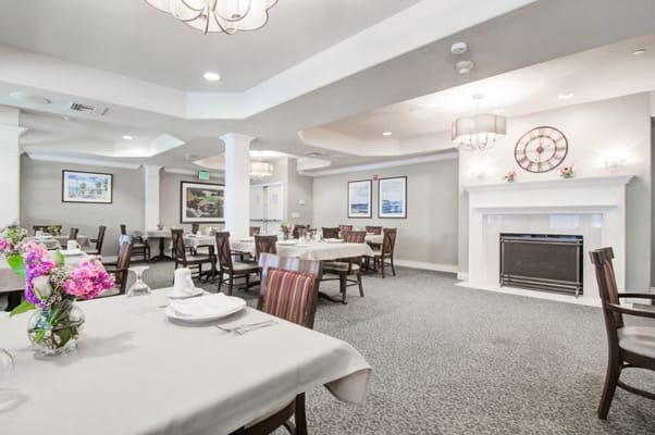 Dining room with tables set for a meal