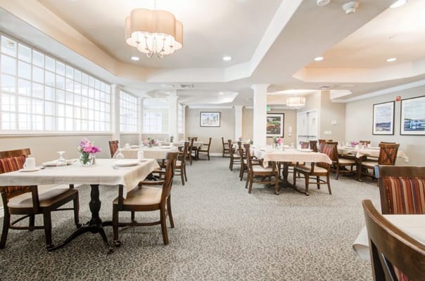 Interior dining area with tables set for meals