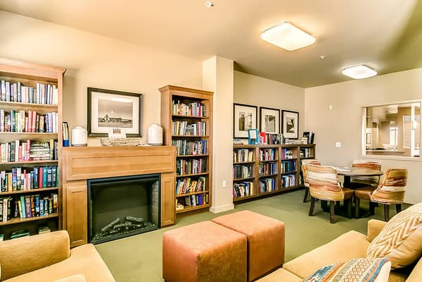 Common area with bookshelves and seating