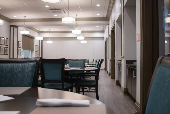 Interior dining area with tables and chairs