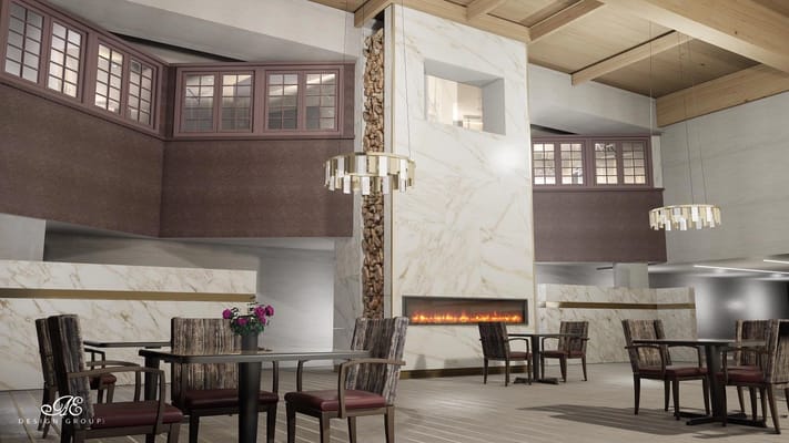 Spacious, modern common area with seating and fire feature