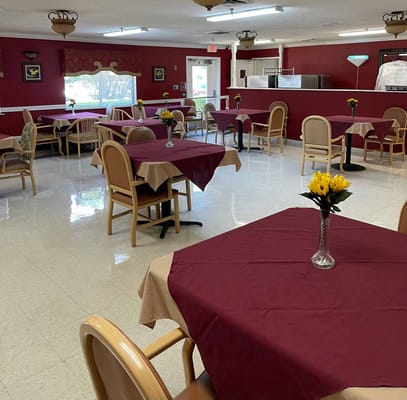 Dining area with tables set for mealtime