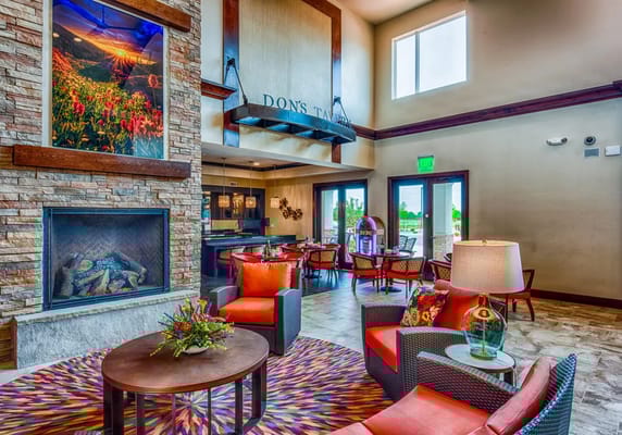 Bright, inviting common area with seating and decor