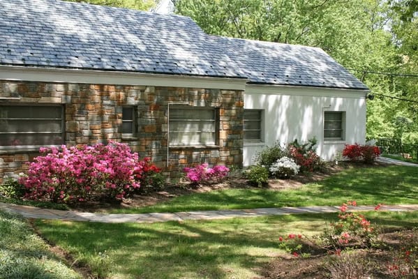 Exterior view of the nursing home with landscaped gardens
