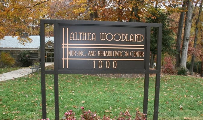 Sign of Althea Woodland Nursing and Rehabilitation Center