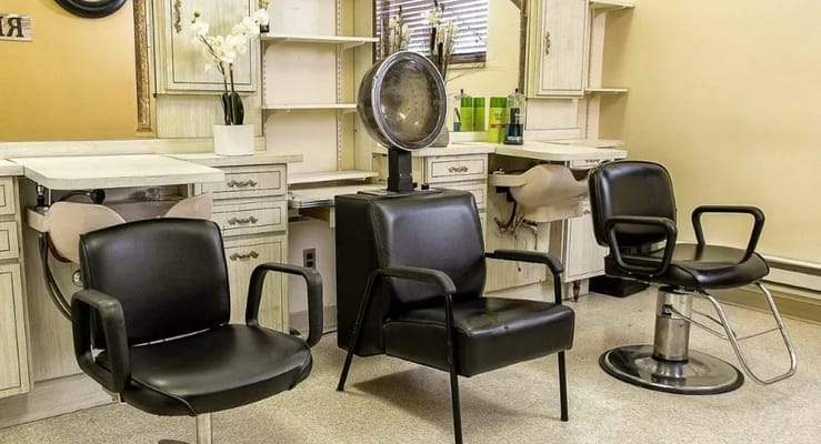 Interior view of a hair salon with styling chairs