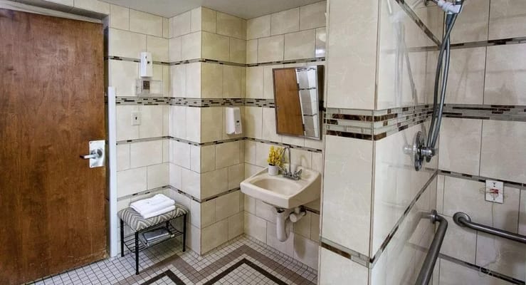 Accessible bathroom with shower and sink