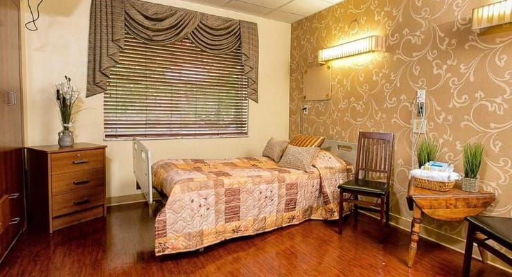 Cozy resident bedroom with warm decor and natural light