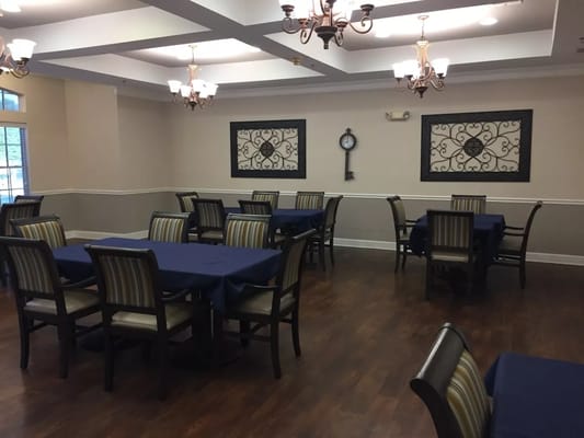 Dining area with tables and chairs set up