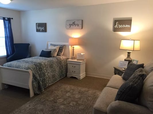 Cozy resident room with decor and furniture