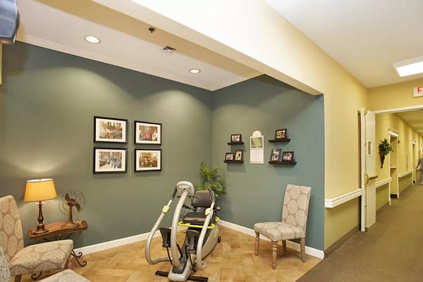 Interior common area with seating and exercise equipment