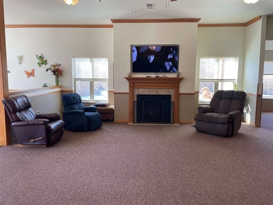 Common area with seating and a TV