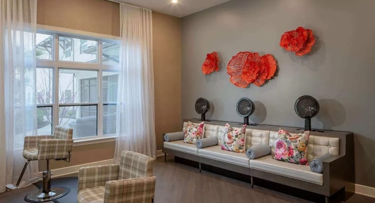 A modern lounge area with stylish seating and decor