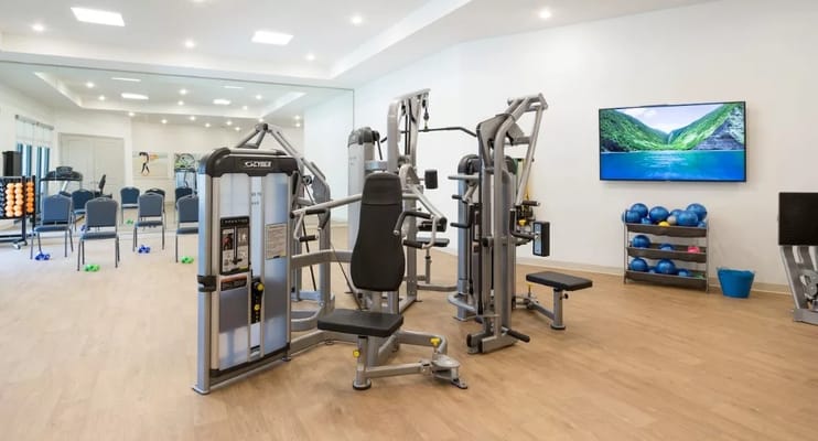Fitness equipment in a bright activity room