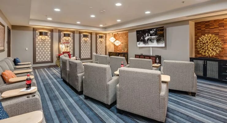 Common area with seating and a television.