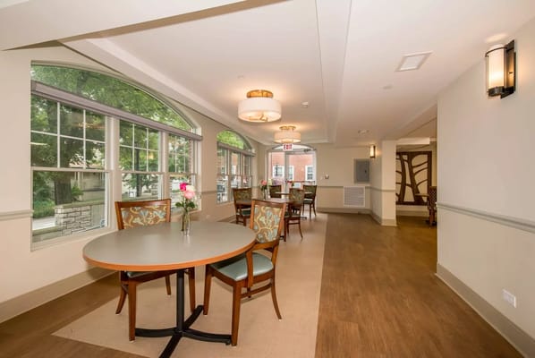 Interior view of a common area with tables and chairs
