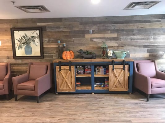 A cozy common area with seating and decor