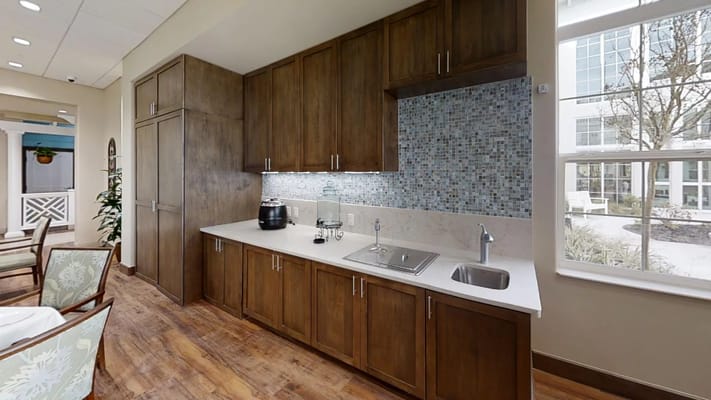 Interior view of a kitchenette area in a common space