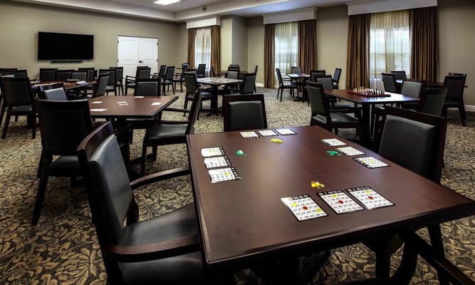 Common area with tables set up for games