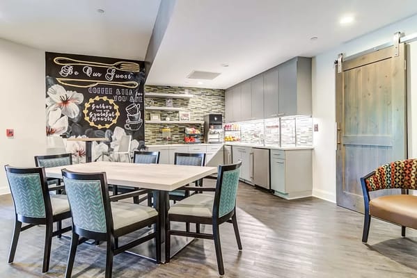 Common area with a coffee station and seating