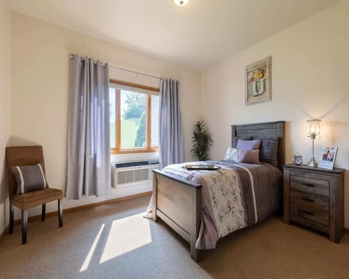 Cozy private room with a bed and window