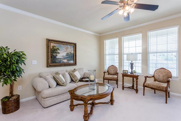 Bright interior living space with furniture and art