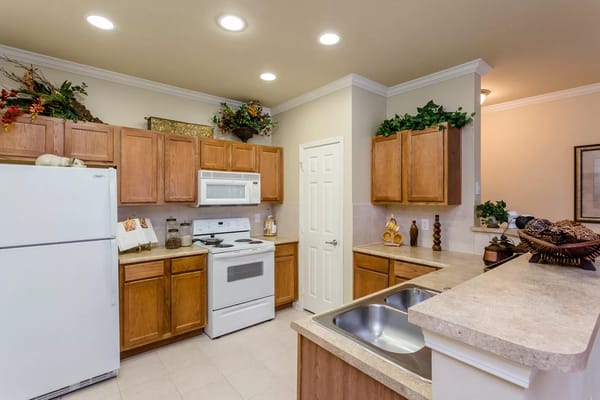 Bright kitchen area with modern appliances