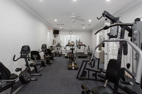 Well-equipped exercise room with gym equipment