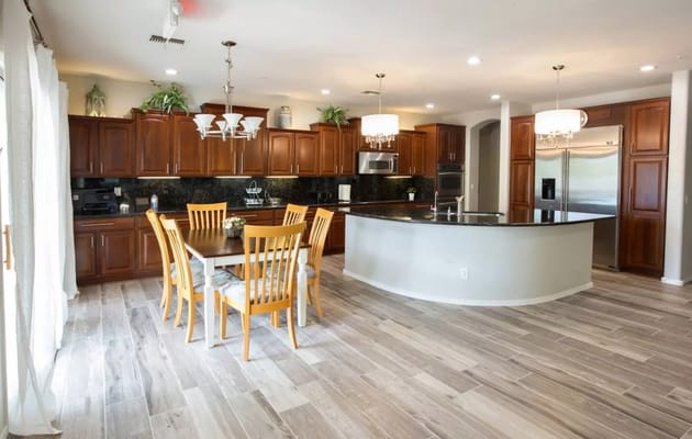 Bright and spacious kitchen area with dining table