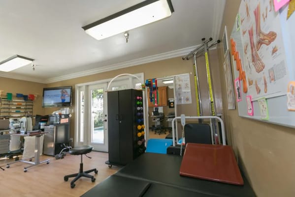 Interior view of a therapy room with equipment
