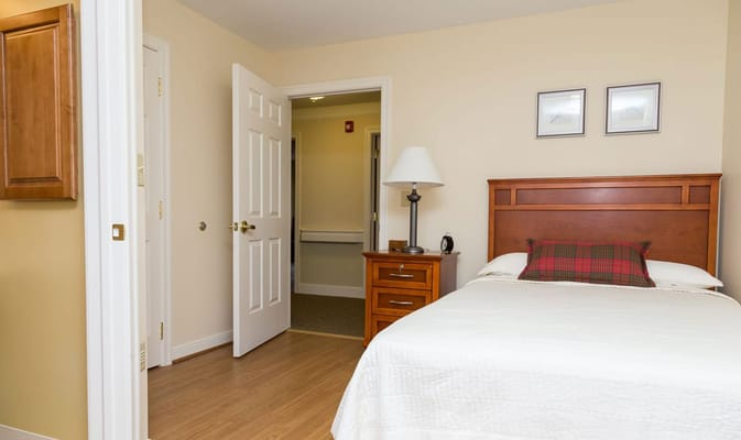 Cozy private bedroom in a senior living facility