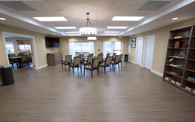 Bright common area with seating and natural light