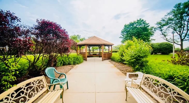 Pathway leading to a gazebo in a garden