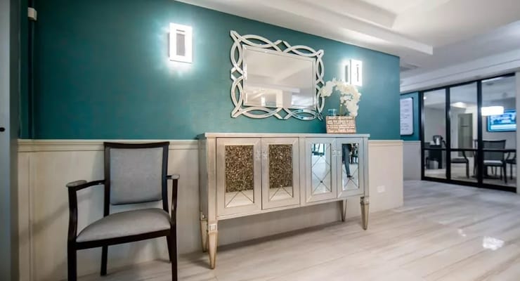 Interior view of a lobby with decorative mirror