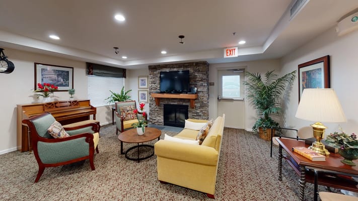 Inviting common area with seating and a piano