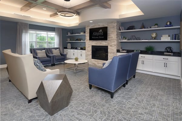 Interior common area with seating and fireplace