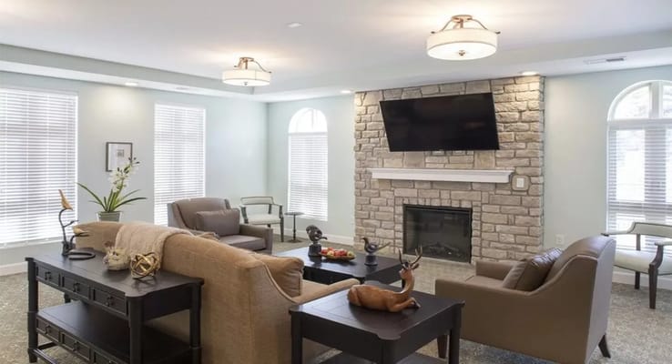 Cozy common area with comfortable seating and a fireplace