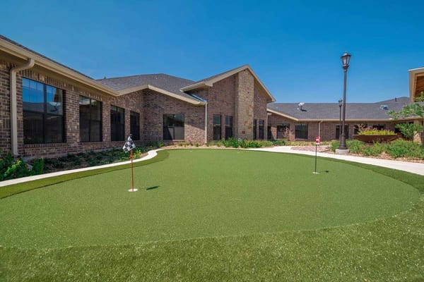 Outdoor putting green at Ashton Medical Lodge