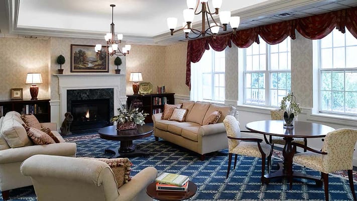 Cozy common area with seating and fireplace