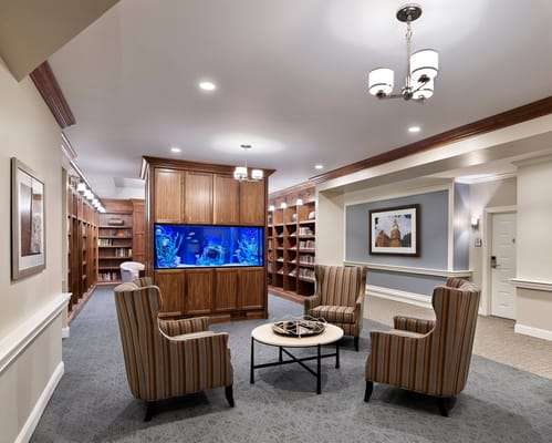 Common area with seating and aquarium