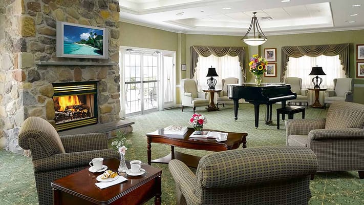 Interior common area with seating and fireplace