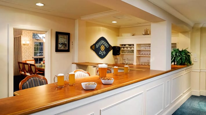 Interior view of a pub with beverages and snacks