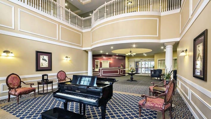Bright and welcoming lobby with a piano