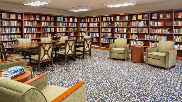 Cozy library with seating and bookshelves