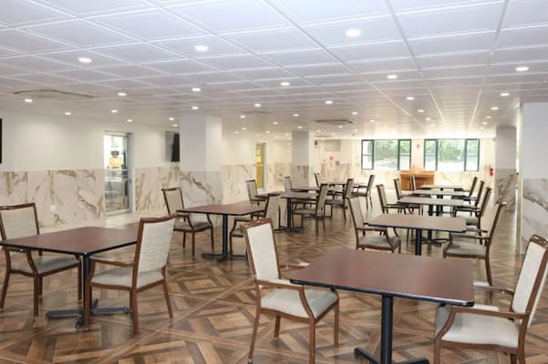 Bright dining room with tables and chairs