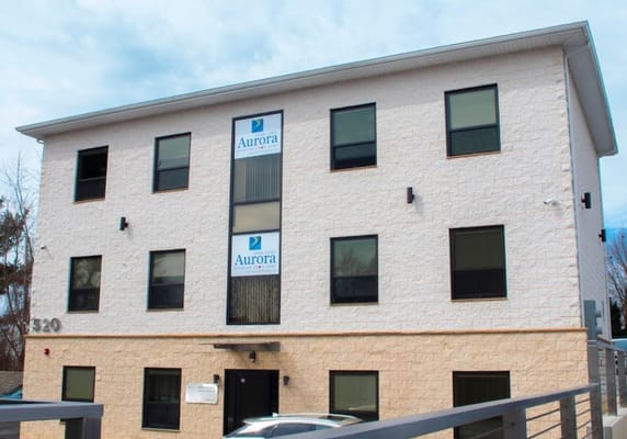 Exterior view of Aurora Home Care facility building