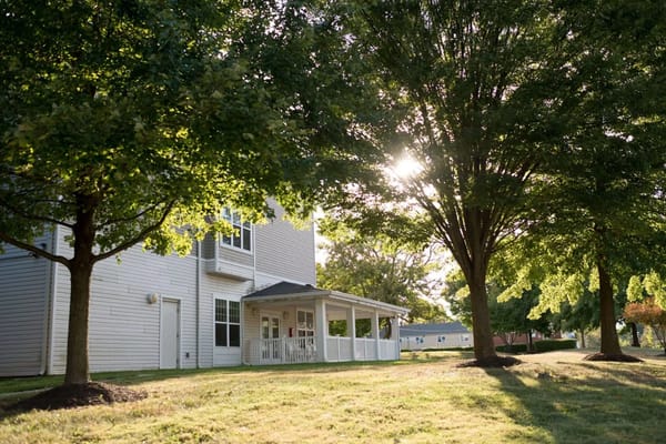 Exterior view of the facility surrounded by trees