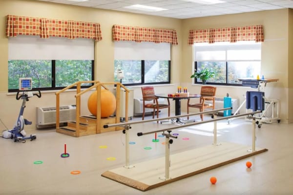 Physical therapy room with exercise equipment
